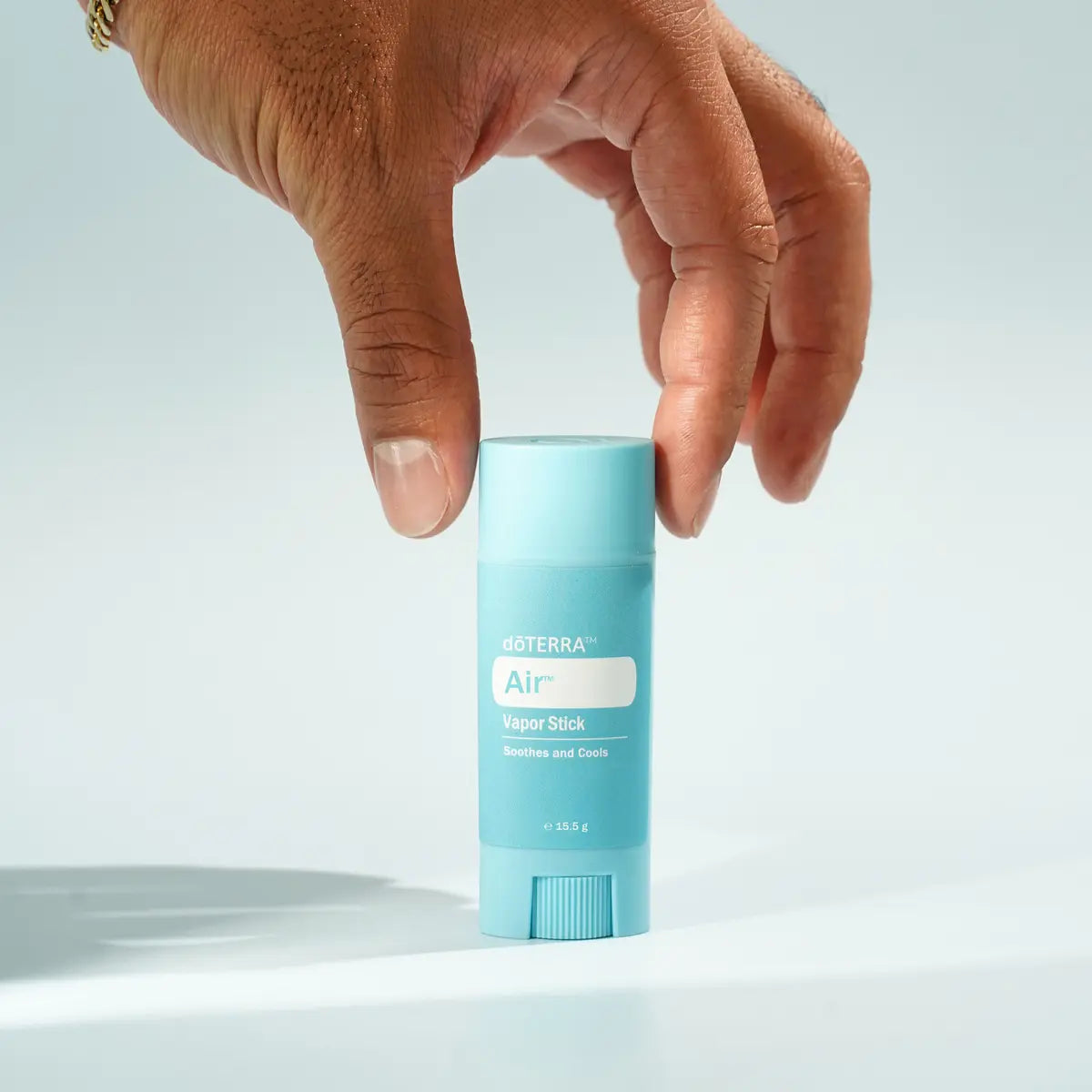Barra Vapor Air doTERRA — estúdio eucalipto hortelã fundo azul, aromaterapia, óleo essencial puro CPTG