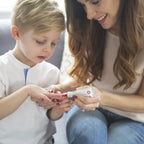 Correct-X doTERRA 15ml — mãe e filho aplicando creme reparador na pele, cuidados naturais