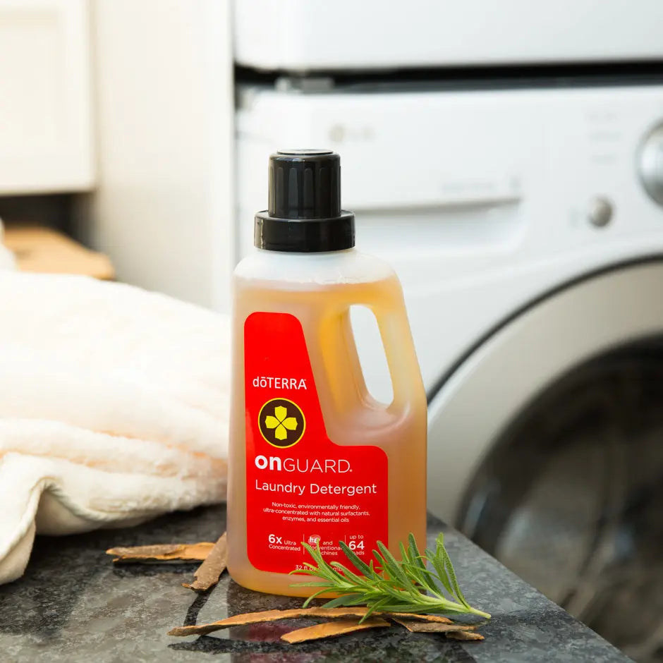 Detergente de Roupa On Guard doTERRA 947ml — lavadora com alecrim e casca de laranja, limpeza natural