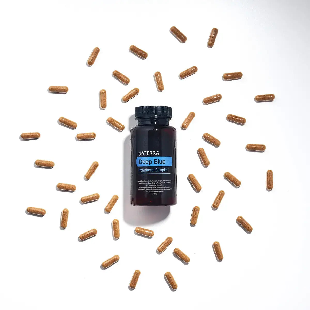 Deep Blue Polyphenol Complex doTERRA 60 cápsulas espalhadas fundo branco — suplemento conforto muscular CPTG