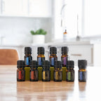 Kit de Família dōTERRA frascos 5ml dispostos em mesa — kit aromaterapia puro CPTG