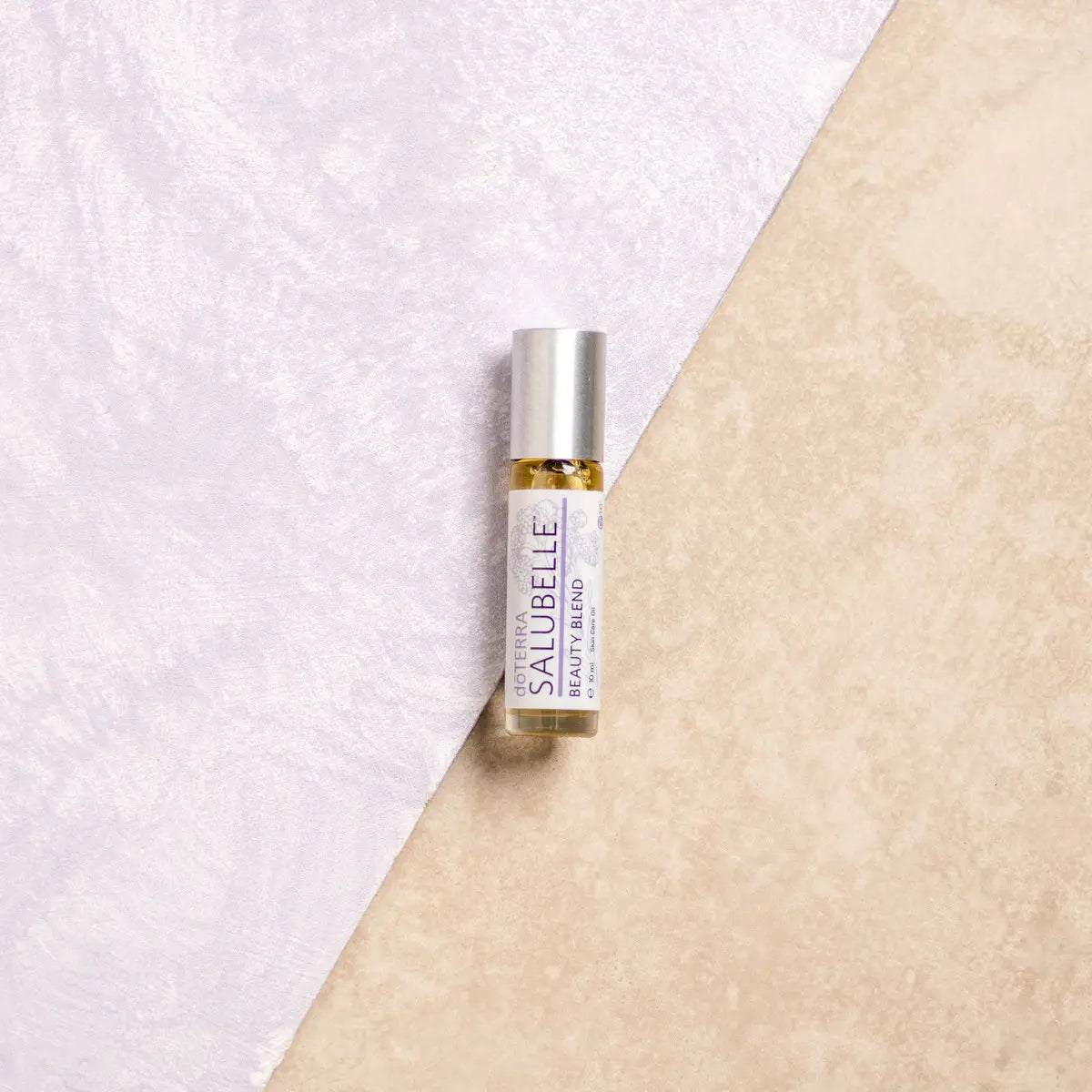 Salubelle doTERRA 10ml — frasco em estúdio estilo lifestyle, óleo essencial puro CPTG, aromaterapia