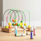 Kit Coleção Crianças doTERRA — cena exterior com crianças em bokeh, óleos essenciais para família