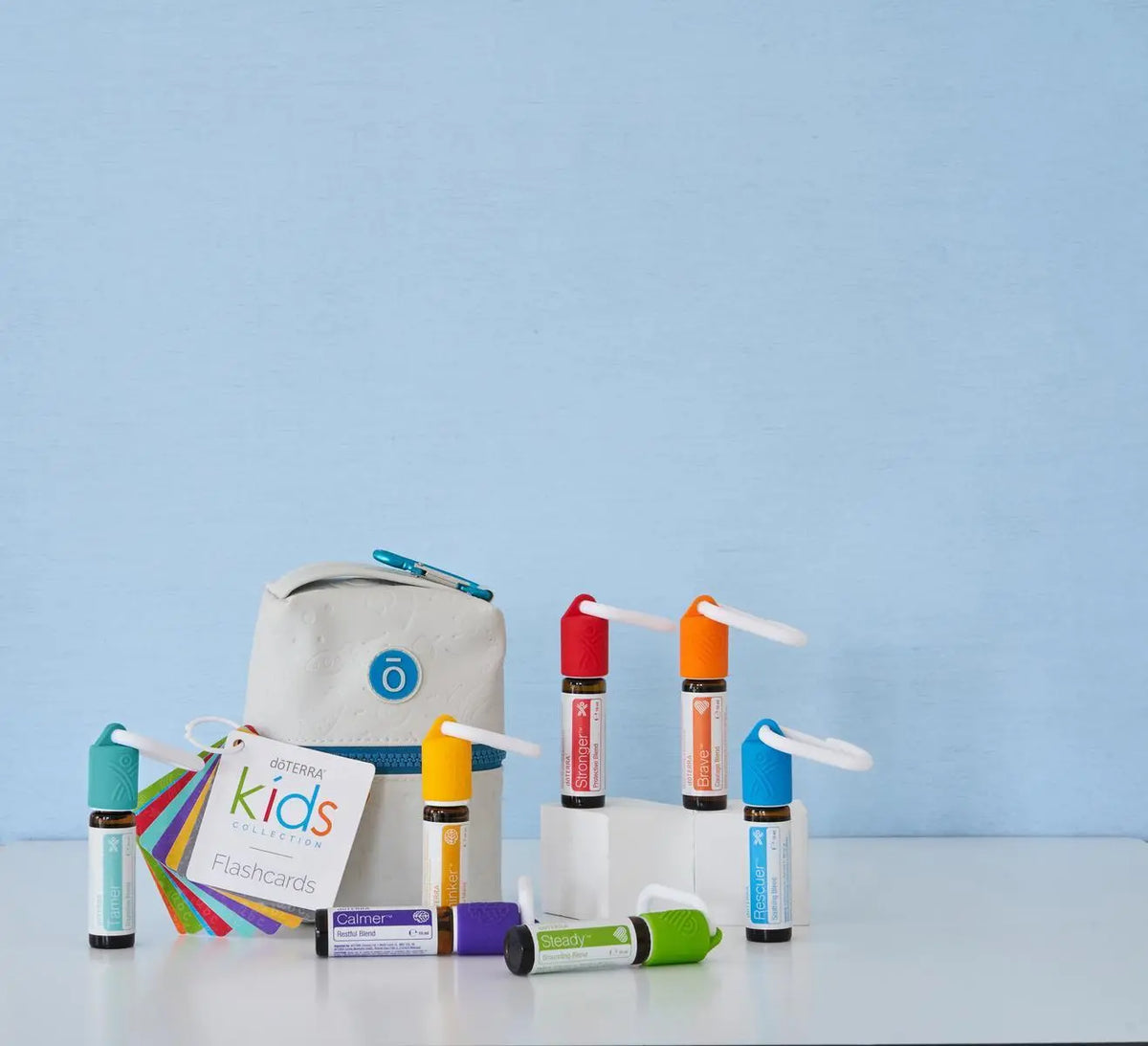 Kit Coleção Crianças doTERRA — cena familiar lifestyle ao ar livre, óleos essenciais seguros para crianças