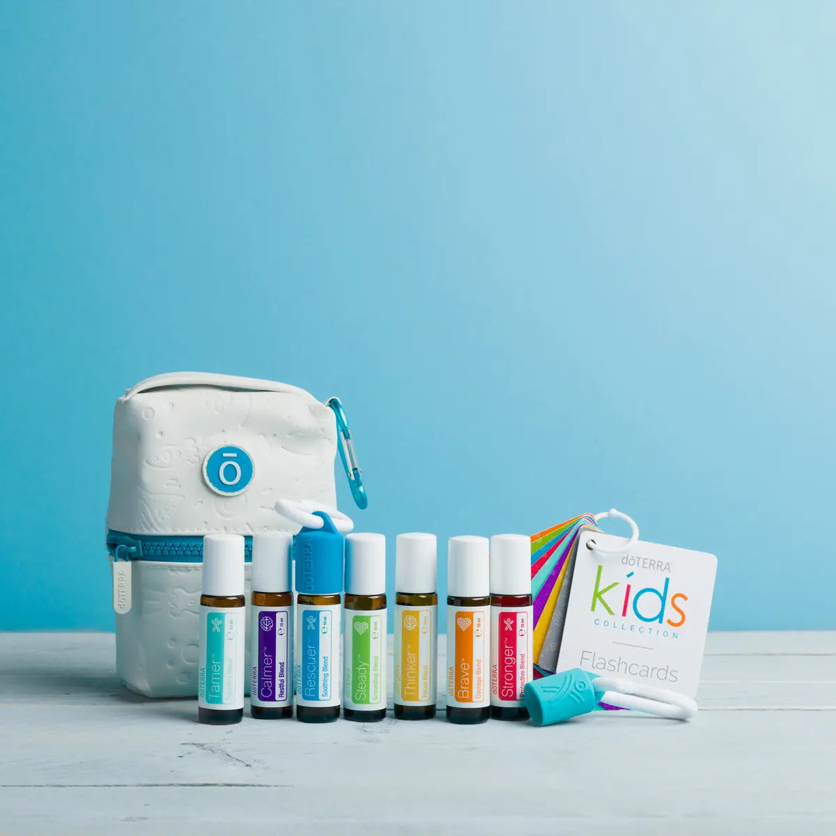 Kit Coleção Crianças doTERRA — cena familiar lifestyle ao ar livre, óleos essenciais seguros para crianças CPTG