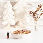Óleo Essencial Canela doTERRA 5ml — tigela de granola e mirtilo com decoração de Natal, aromaterapia CPTG doTERRA