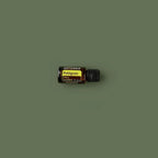 Óleo Essencial de Petitgrain doTERRA 15ml frasco inclinado superfície verde oliva — aromaterapia CPTG