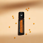 Beadlets MetaPWR doTERRA — frasco vertical com bolinhas laranjas dispersas, fundo torrado, suplemento energético CPTG