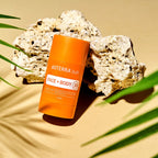 Stick Solar Mineral Rosto+Corpo doTERRA SPF30 50g — rochas coral com folhas de palmeira e areia, mineral natural CPTG