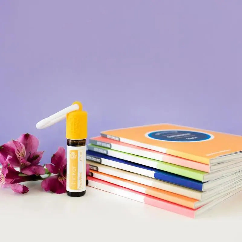 Thinker doTERRA Roll-On 10ml — capa amarela com cadernos em fundo roxo, mistura concentração CPTG