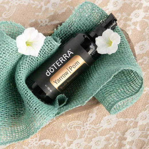Sérum Yarrow Pom doTERRA 100ml — frasco dourado fundo claro, skincare natural, óleo essencial puro CPTG