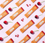 MetaPWR Advantage doTERRA sabor cereja-romã — saquetas em contexto de estúdio, suplemento metabolismo puro certificado