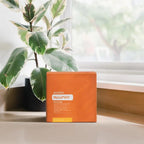 MetaPWR Advantage doTERRA — saquetas com planta em fundo claro, vista aérea, suplemento anti-envelhecimento natural
