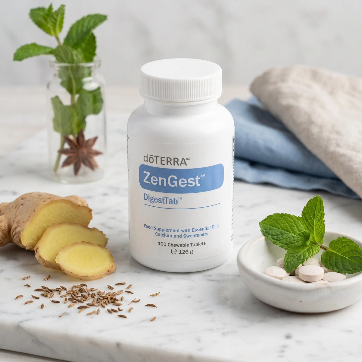 DigestTab doTERRA comprimidos mastigáveis com gengibre cominhos e hortelã em tigela de mármore — suplemento digestivo natural CPTG